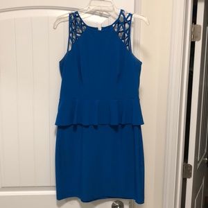 Vibrant BISOU BISOU peplum dress.